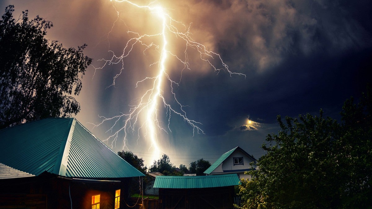 Lightning striking near homes