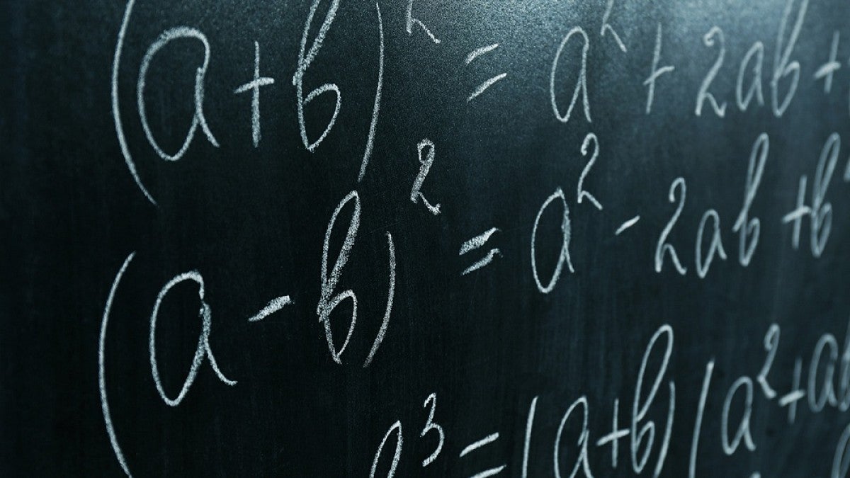 Algebra equations on chalkboard