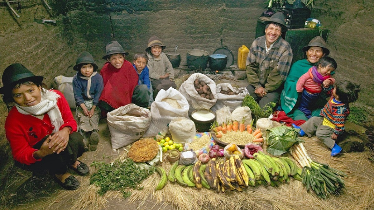 Family at a food booth in Ecuador