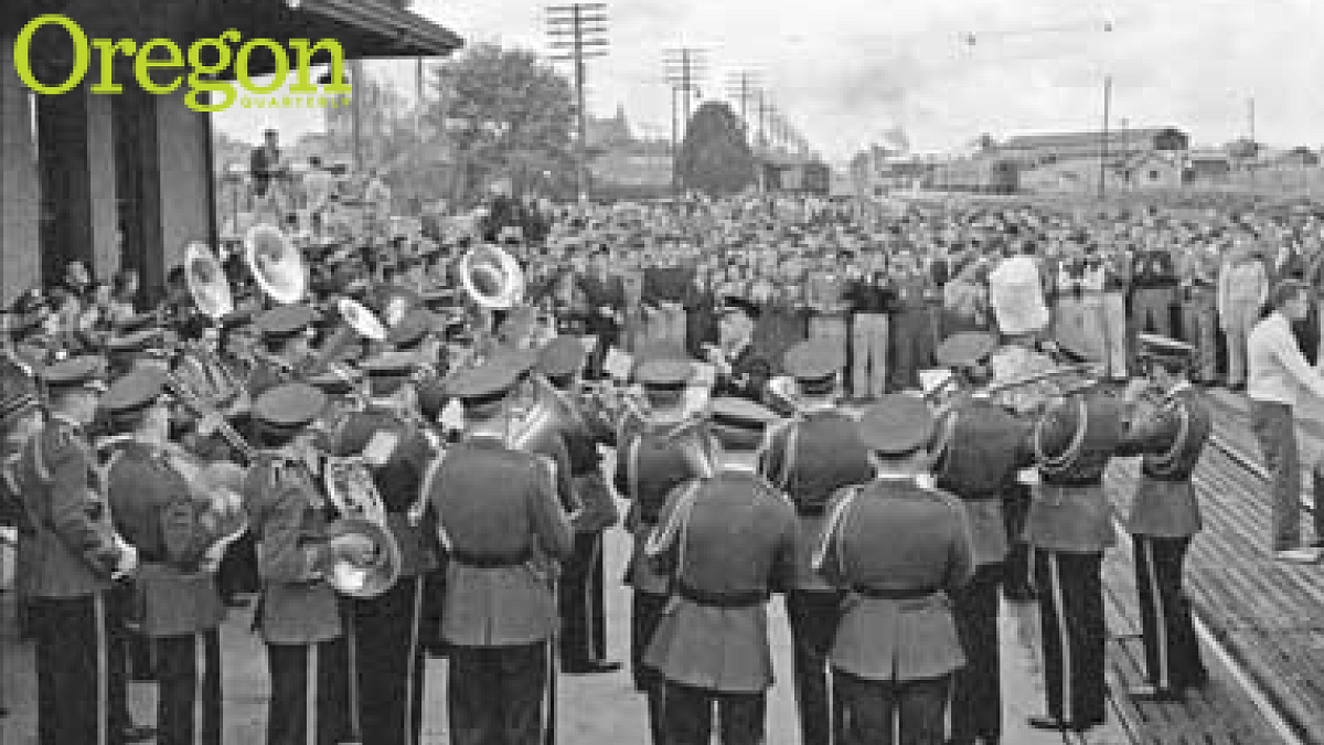 The University of Oregon Marching Band at the Eugene train station to welcome home the basketball team after they won the 1939 NCAA basketball championship. Photograph courtesy UO Libraries Special Collections and University Archives