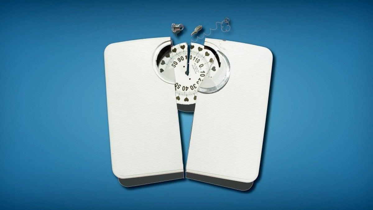 Image of a broken scale with hearts at the weight denominations
