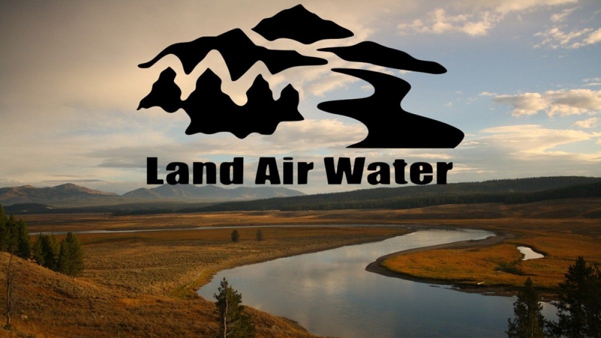 River and mountains with Land Air Water logo