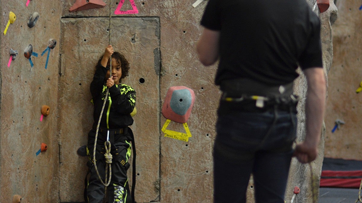 Child at climbing wall