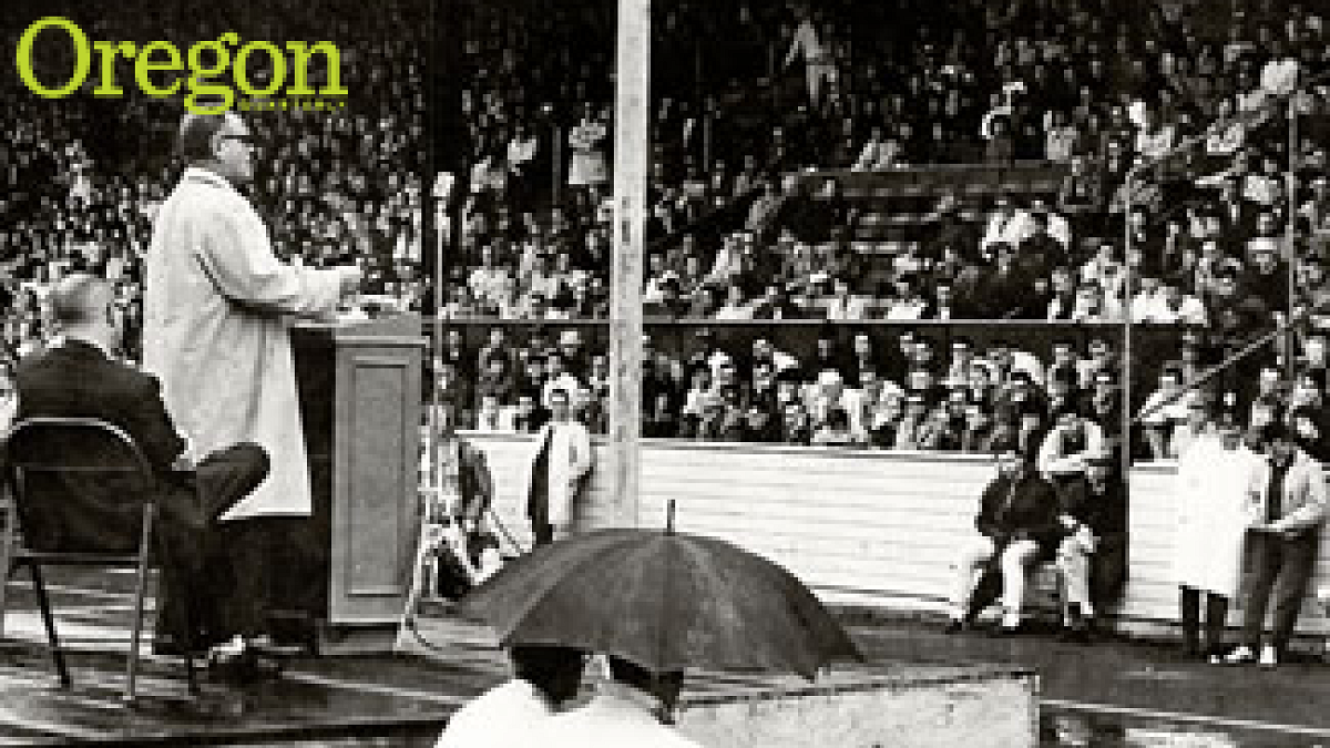 Gus Hall, leader of the Communist Party USA, speaking at Hayward Field in 1962. Photograph courtesy UO Libraries Special Collections and University Archives