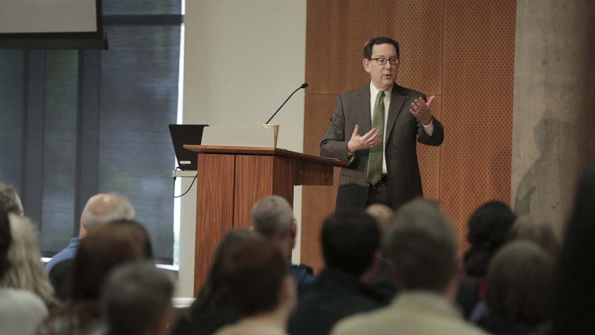 UO President Michael Schill addressing a campus audience Tuesday, April 12.