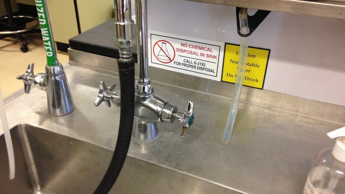 Sink with warning sticker