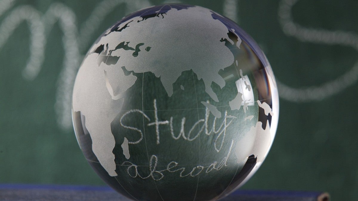 Crystal globe with 'study abroad' written on it.