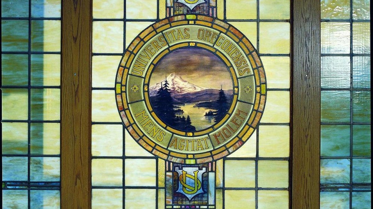 UO seal in stained glass