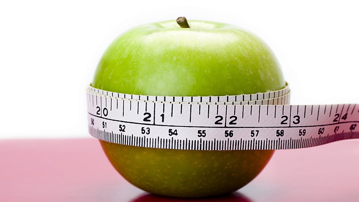 Apple and measuring tape image