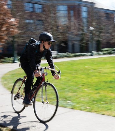 Willem Griffiths zips through campus on his bike.