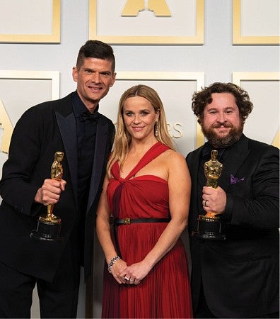 Govier (right), with Witherspoon and McCormick at the Oscars (credit: Matt Petit, Academy of Motion Picture Arts and Sciences)