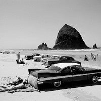 Cars on Cannon Beach by Ray Atkeson