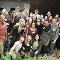 Ann Curry posing with students and faculty