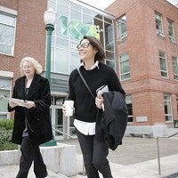 Ann Curry outside Allen Hall with journalism dean Julianne Newton