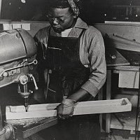 Lucille Little, Douglas Aircraft Co. works on airplane